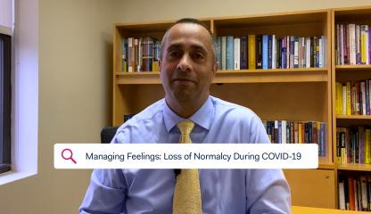 Dr. Simon Rego, Montefiore's Chief Psychologist, sitting in an office discussing feelings of loss of normalcy during COVID-19.